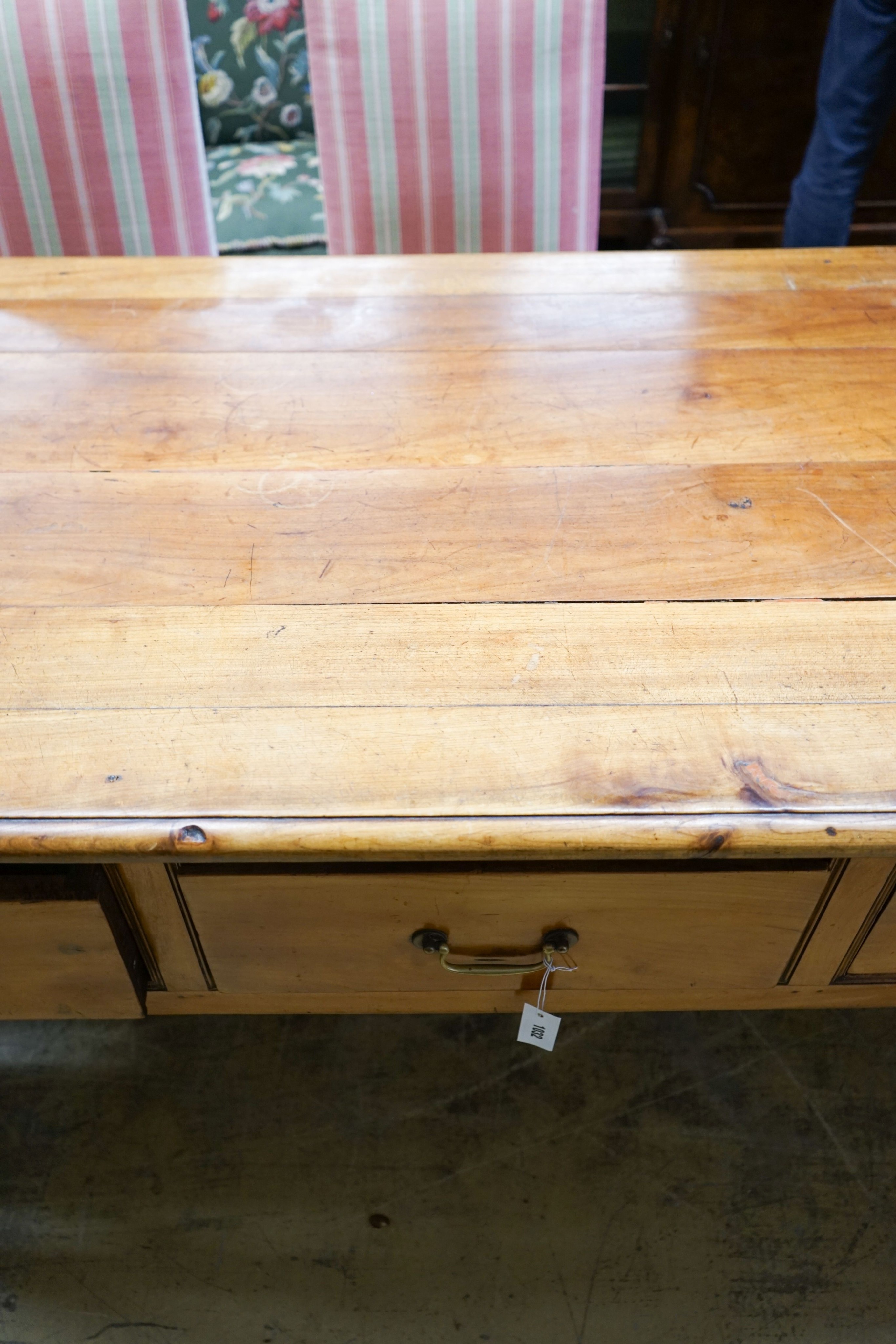 A 19th century French cherrywood six drawer serving table, length 200cm, depth 79cm, height 84cm